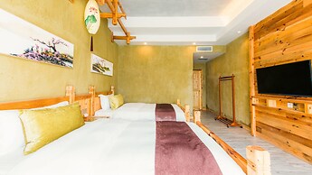 Floral Hotel Fenghuang Huercaowu