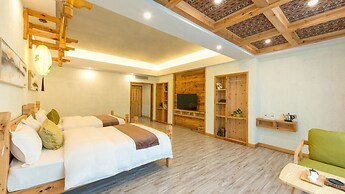 Floral Hotel Fenghuang Huercaowu