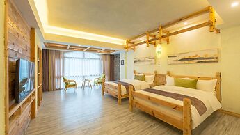 Floral Hotel Fenghuang Huercaowu