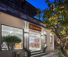 Floral Hotel Dali Yixin Yard