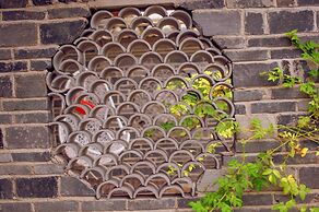 Floral Hotel Tengchong Heshun Hemuju