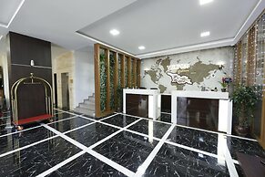 Olympus Hotel By Umbrella
