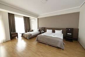 Olympus Hotel By Umbrella