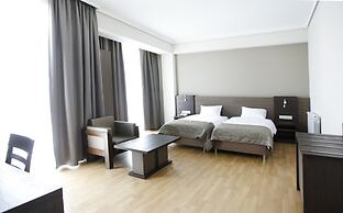 Olympus Hotel By Umbrella