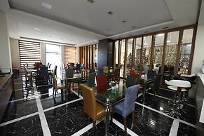 Olympus Hotel By Umbrella