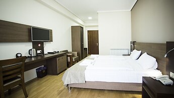 Olympus Hotel By Umbrella