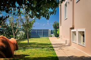 Balconies on Sea - The Garden Apartment