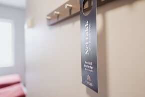 Wood Hotel by Frich's