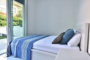 The White Apartment With Pool