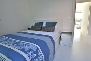 The White Apartment With Pool