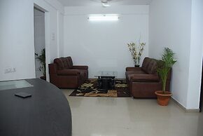 JK Rooms 132 Parkland Service Apartment