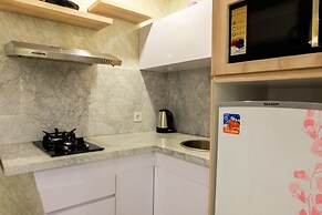 Comfortable Premiere 1BR at The Oasis Apartment