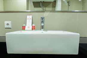 Studio Room Azalea Suites Apartment