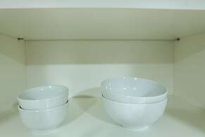 Studio Room Azalea Suites Apartment