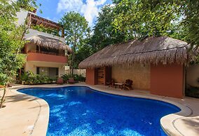 Condos Perfectly Situated Between the Beach & Tulum Town by Stella Ren