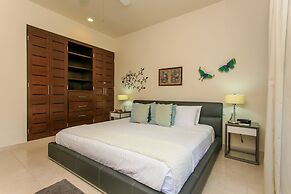 Condos Perfectly Situated Between the Beach & Tulum Town by Stella Ren