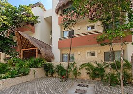Condos Perfectly Situated Between the Beach & Tulum Town by Stella Ren