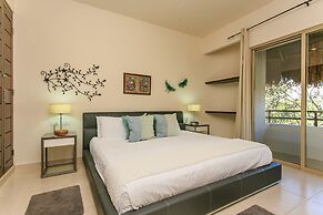 Condos Perfectly Situated Between the Beach & Tulum Town by Stella Ren