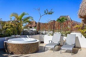 Condos Perfectly Situated Between the Beach & Tulum Town by Stella Ren