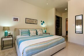 Condos Perfectly Situated Between the Beach & Tulum Town by Stella Ren