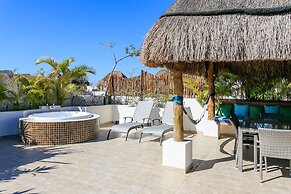 Condos Perfectly Situated Between the Beach & Tulum Town by Stella Ren
