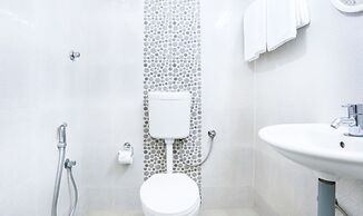 Treebo Comforts Inn, University Road Deralakatte