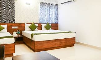 Treebo Comforts Inn, University Road Deralakatte