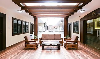 Treebo Comforts Inn, University Road Deralakatte