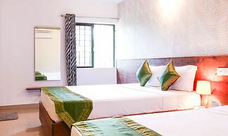 Treebo Comforts Inn, University Road Deralakatte