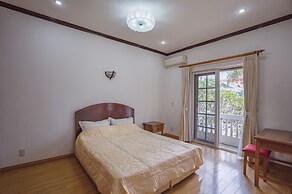 Coco Flower Village Serviced Apartment
