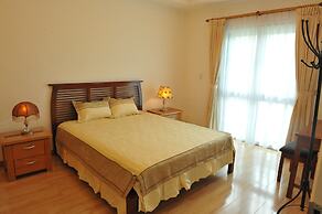 Coco Flower Village Serviced Apartment