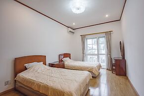 Coco Flower Village Serviced Apartment