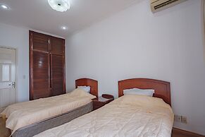 Coco Flower Village Serviced Apartment