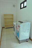 Coco Flower Village Serviced Apartment