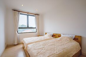 Coco Flower Village Serviced Apartment