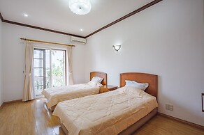 Coco Flower Village Serviced Apartment