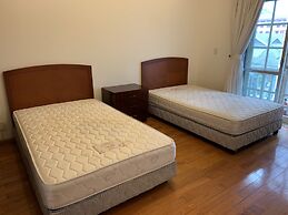 Coco Flower Village Serviced Apartment