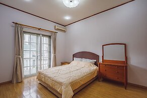 Coco Flower Village Serviced Apartment