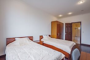 Coco Flower Village Serviced Apartment