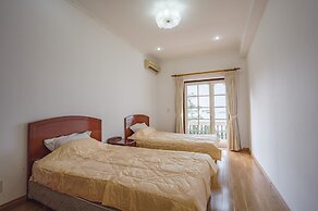 Coco Flower Village Serviced Apartment