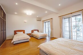 Coco Flower Village Serviced Apartment
