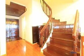 Coco Flower Village Serviced Apartment