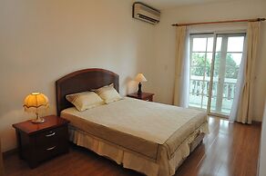 Coco Flower Village Serviced Apartment