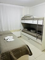 Beach Class Slin Muro Alto