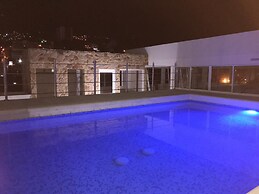 Apartasuites La Flora