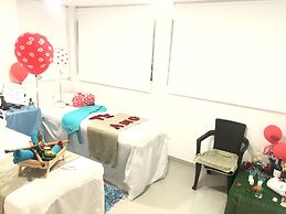 Apartasuites La Flora