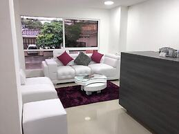 Apartasuites La Flora