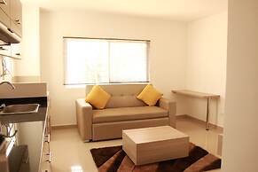 Apartasuites La Flora