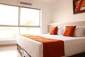 Apartasuites La Flora