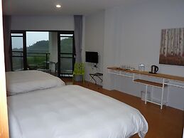 Xi Tou in Sunny Day Inn